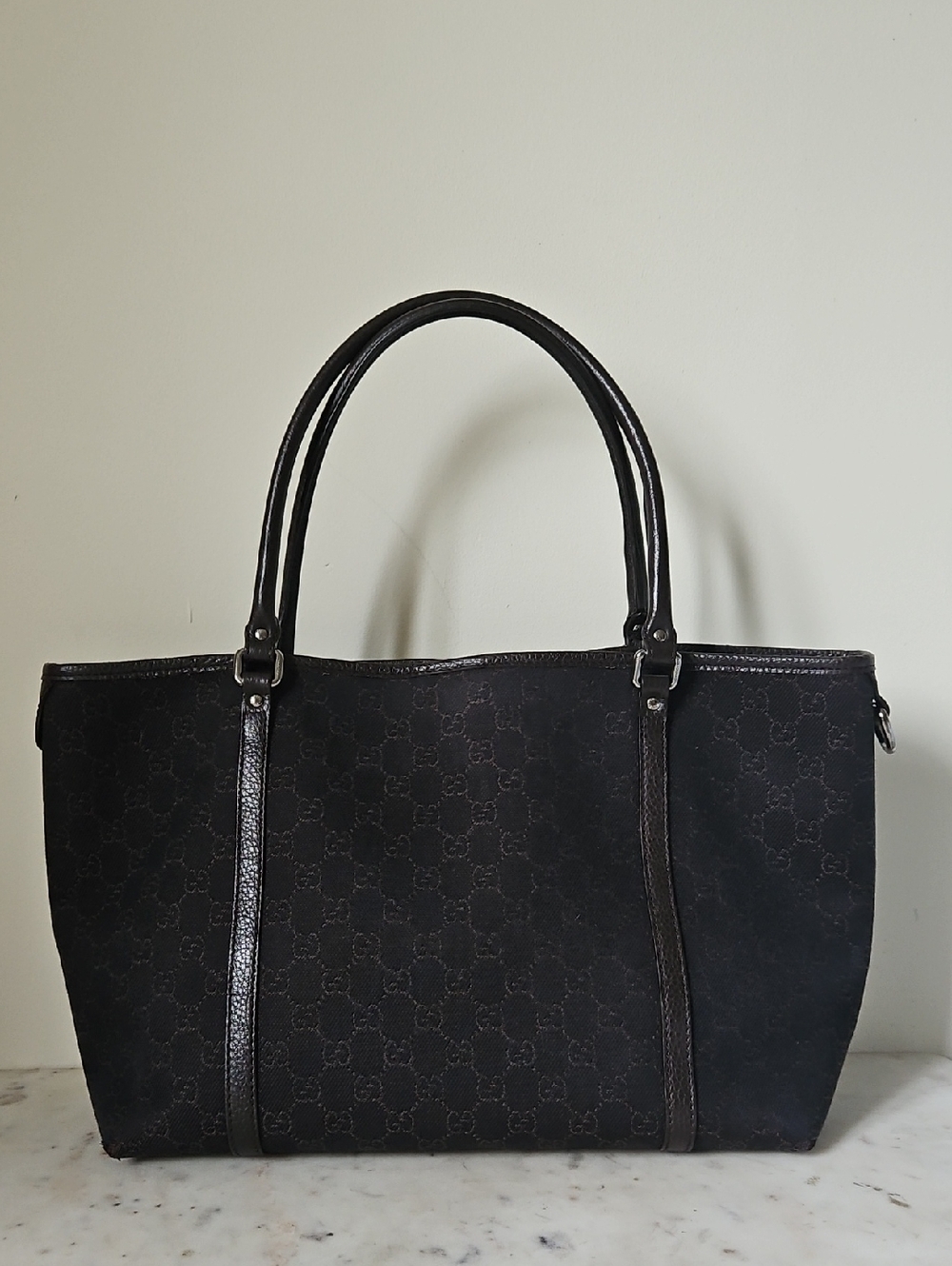 GUCCI: Chocolate Brown Leather Trim Monogram Canvas Shoulder Tote